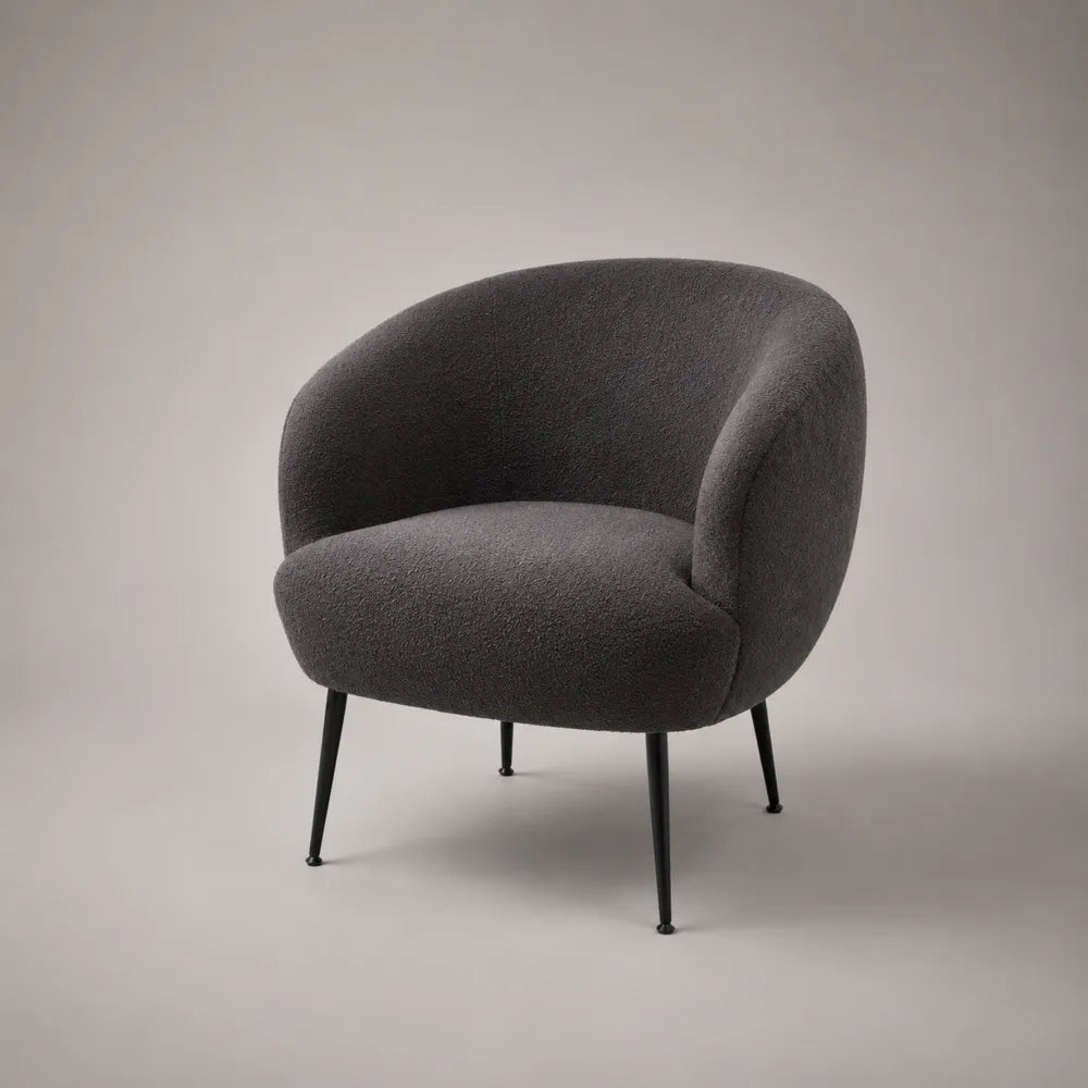 Poltrona imbottita in tessuto bouclé grigio con gambe in acciaio nero 75 cm