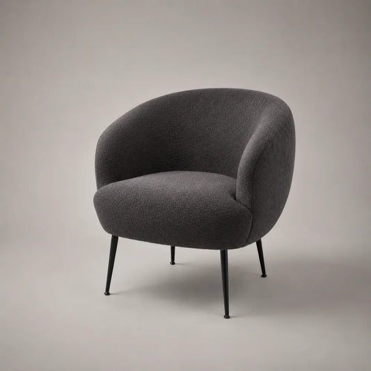 Poltrona imbottita in tessuto bouclé grigio con gambe in acciaio nero 75 cm